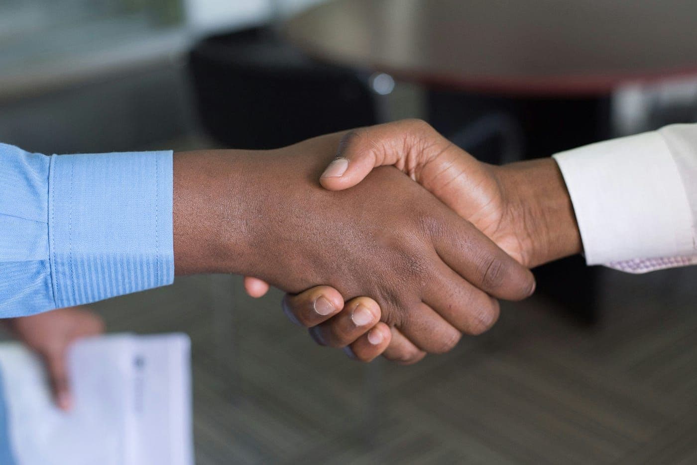 The History and Significance of Handshaking in Human Interaction